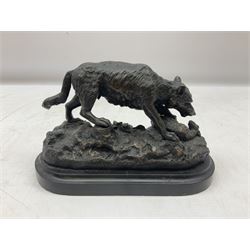 Bronze figure of a wolf with lamb prey, L18cm