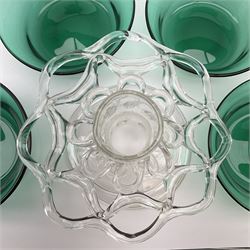 Set of four early 19th century Bristol green glass finger bowls, circa 1820, D12cm, together with with a Georgian clear glass flower frog with folded foot, H10.5cm L15.5cm.