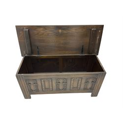 Old Charm - oak blanket box, hinged top, carved front