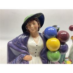 Three Royal Doulton figures, comprising Balloon Lady HN293, The Old Balloon Seller HN1315 and Biddy Penny Farthing HN1843, all with printed marks beneath