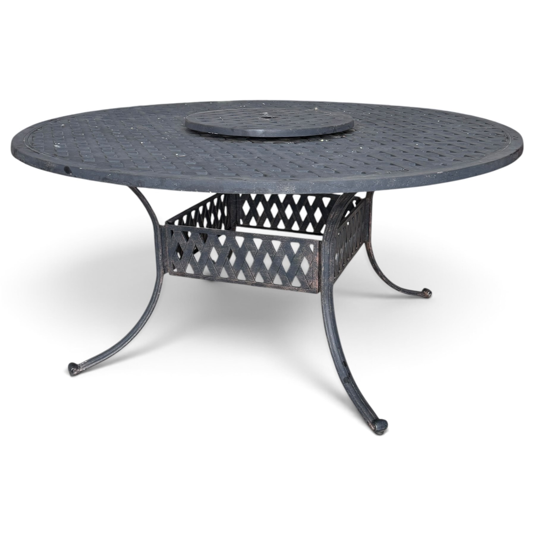 Grey-painted cast metal garden dining suite, comprising circular latticework table on splayed supports (W152cm H72cm), and six matching open armchairs with lattice backs and seats (W61cm H93cm)