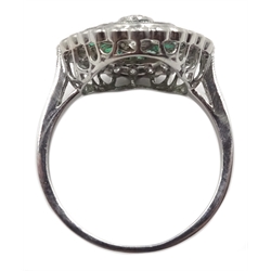  Platinum (tested) round brilliant cut diamond and calibre cut emerald ring, with diamond set shoulders  