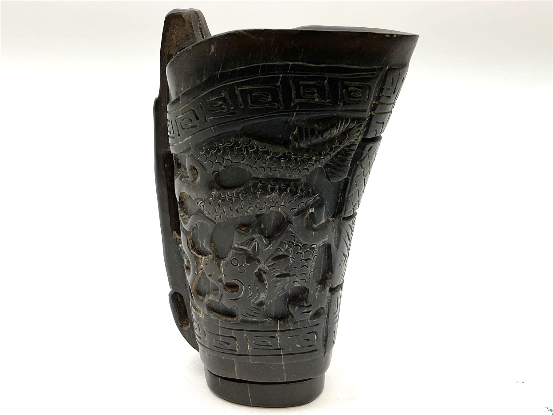 Chinese horn blood collection cup, carved with dragons and key fret border, H9.5cm
