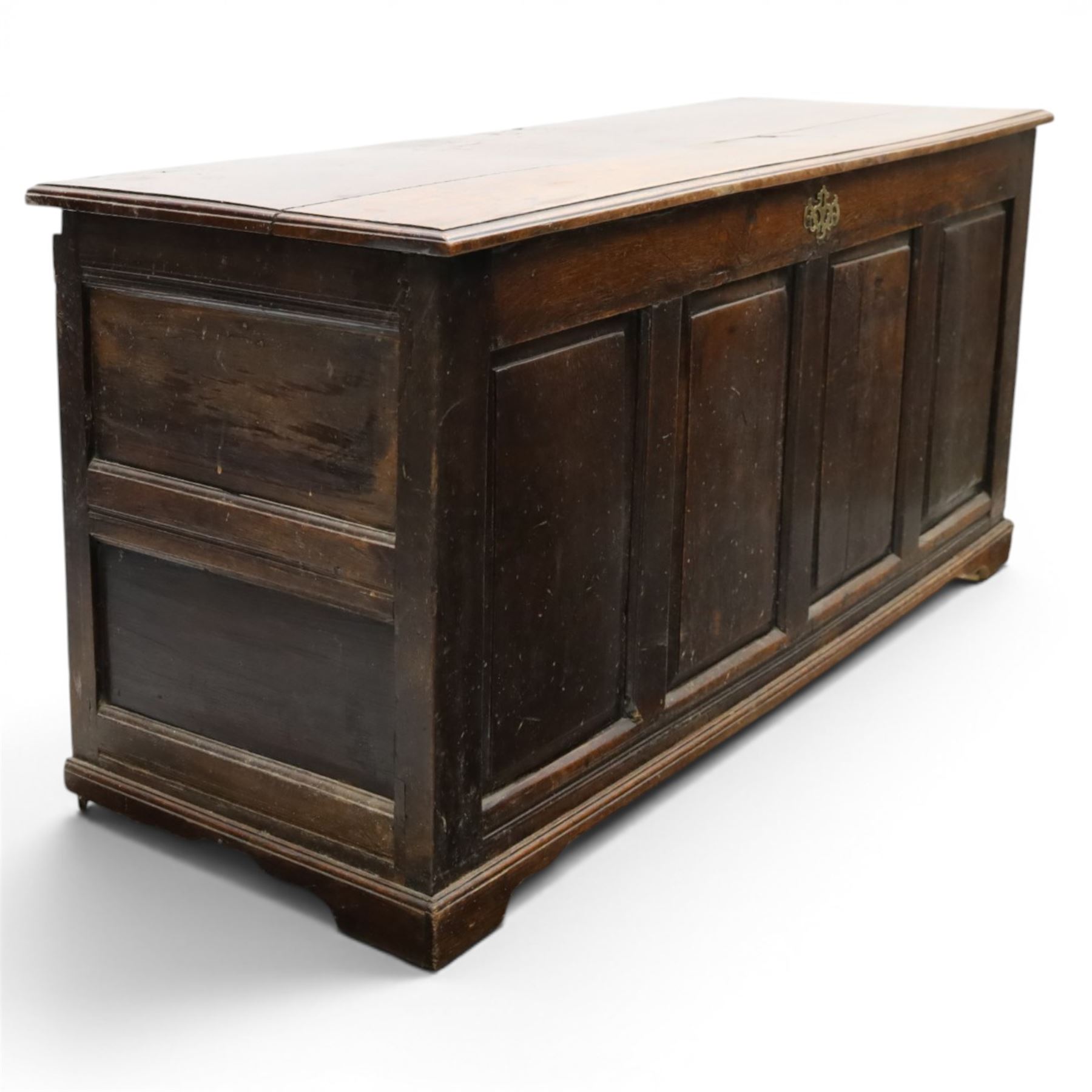 18th century oak coffer, rectangular top with moulded top, four fielded panel front, raised on a moulded plinth base