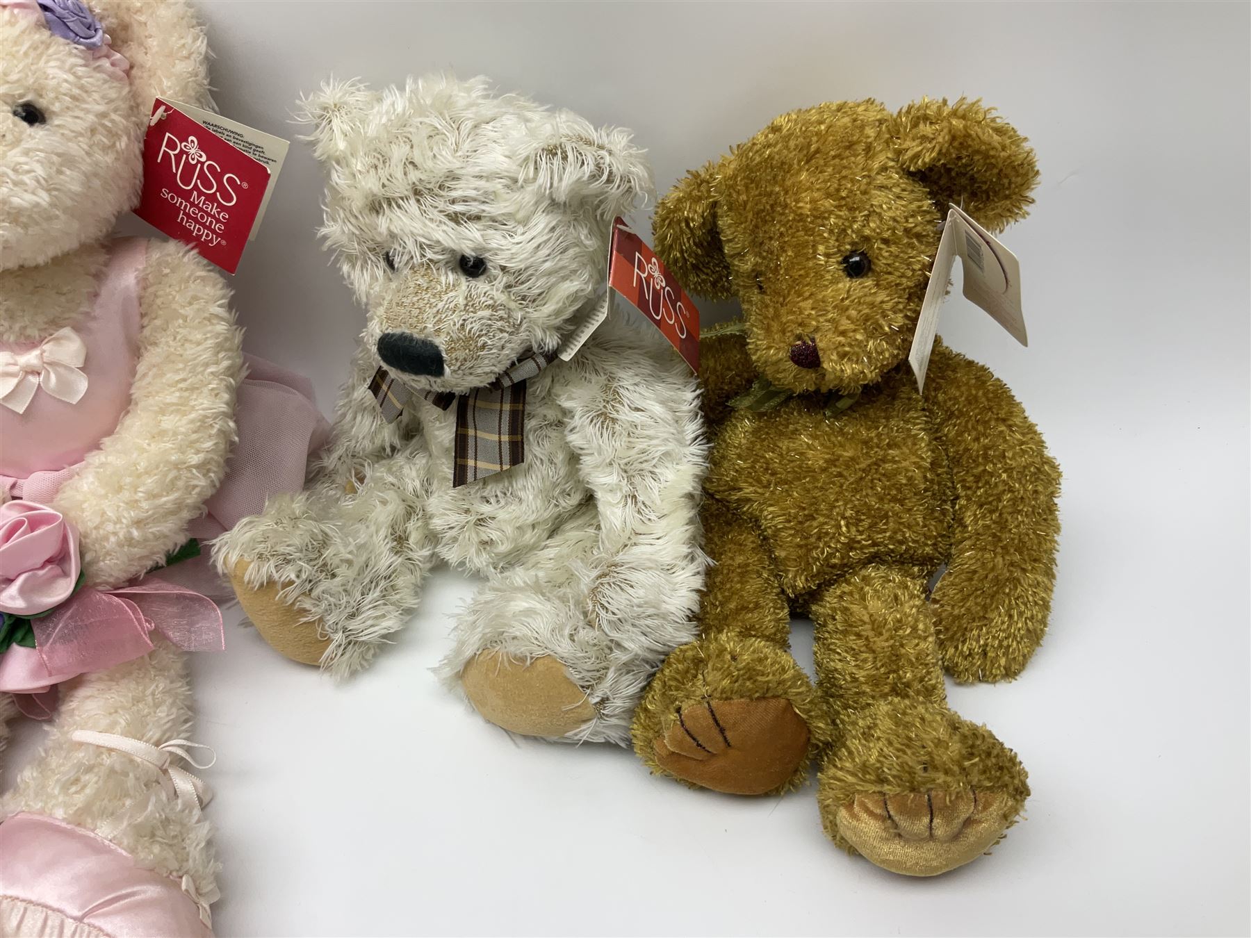 Eighteen Russ teddy bears including Ariella, Chloe, Spencer and Desmond,  mostly with tags, together with six other soft toys, tallest H42cm (24)