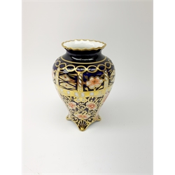 Three pieces of Imari pattern Royal Crown Derby, comprising small vase marked 1338, 6299, H12cm, further small vase marked 1736, H10cm, 6299, and pin dish, D11cm. (3). 