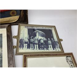 RNLI collection box in the form of a boat makers half block model, painted in the colours of a lifeboat with flag and ship motifs, H25cm, L73cm together with framed photos, postcards and prints of lifeboats and crew, including Scarborough lifeboat station