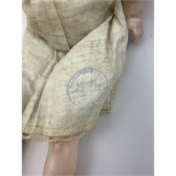 Early 20th century Cuno and Otto Dressel wax shoulder head doll with applied hair and fixed glass eyes, soft body with jointed composition lower limbs, maker's stamp to right thigh, clothing and box H38cm in original box