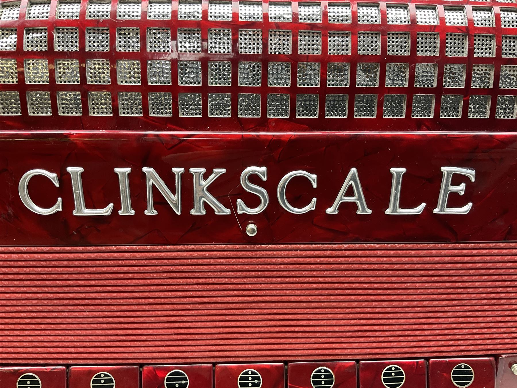 Clinkscale Crucianelli piano accordion in red pearline case with one-hundred and twenty buttons and forty-one keys L52cm; in carrying case