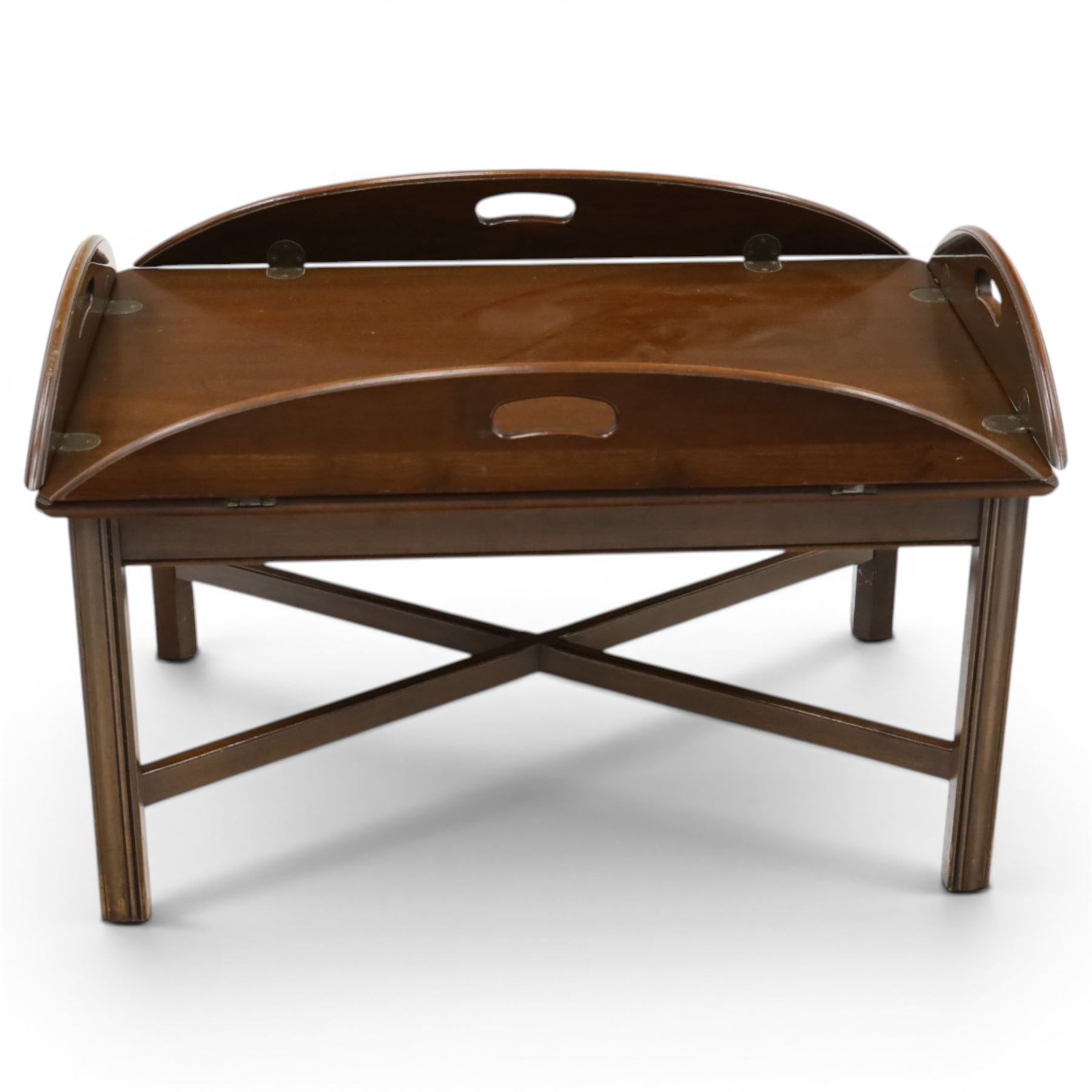 Georgian design mahogany butler's tray coffee table, rectangular tray with hinged shaped sides and pierced carrying handles, on square supports united by X-shaped stretchers