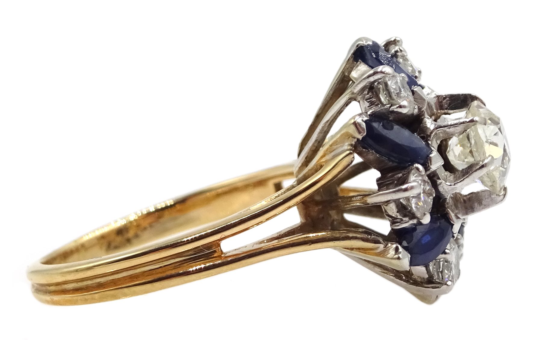 18ct gold diamond and sapphire ring, the central old cut diamond of approx 0.75 carat, with round brilliant cut diamonds and marquise cut sapphires