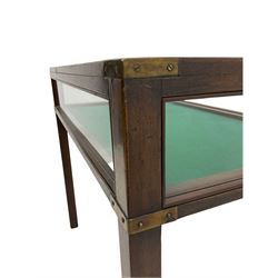 Mahogany bijouterie table-vitrine, glazed with hinged panel, on square supports with brass fittings and key