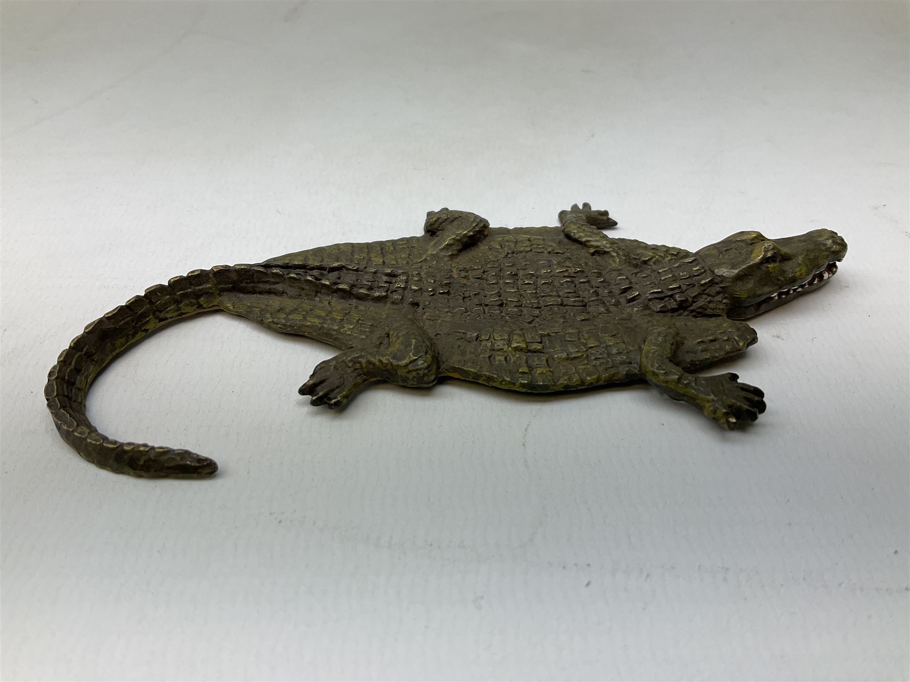 After Franz Xavier Bergman, two cold painted bronzes modelled as a crocodile skin, and a zebra skin, each stamped beneath with B within an amphora and Austria, crocodile L12.5cm, zebra 10.5cm