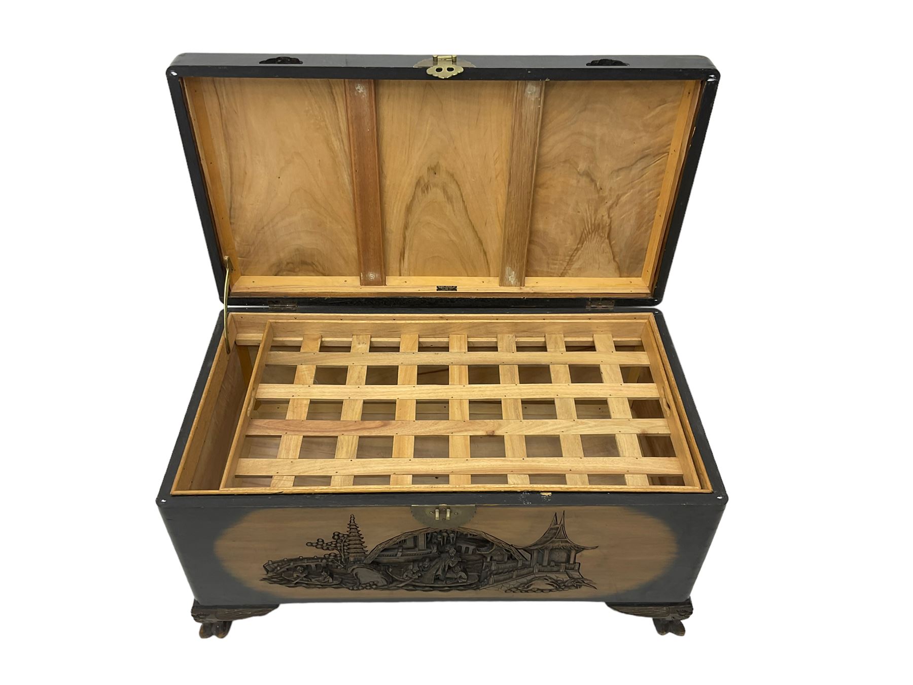 Singapore camphor wood blanket chest, rectangular hinged top with carved panel depicting traditional pagoda and river scenes