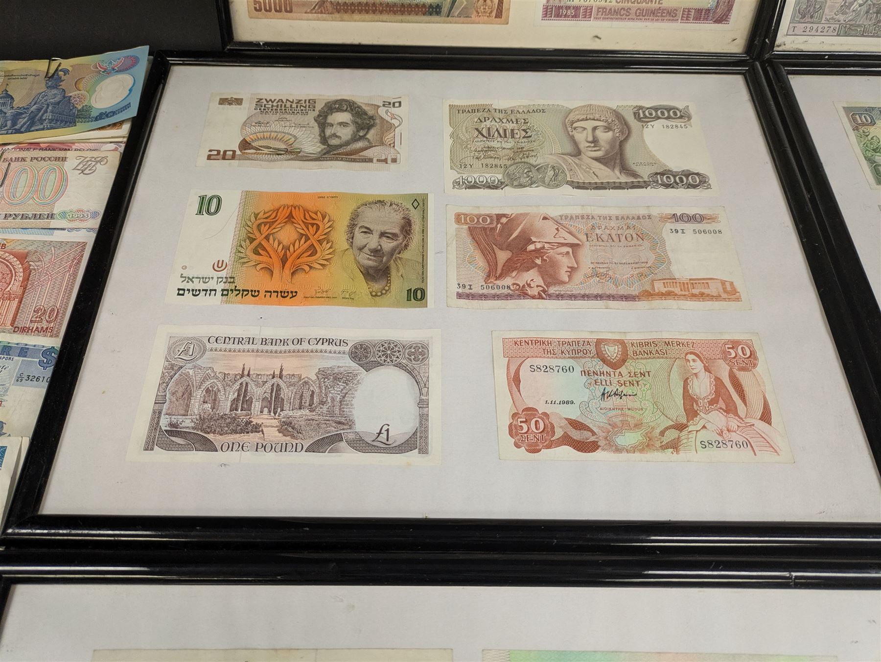 World banknotes, including Central Bank of Nigeria, Indonesia, Central Bank of Egypt, Republic of Liberia, Central Bank of Kenya, Central Bank of the Gambia, Singapore, Belgium etc, loose and in five framed displays