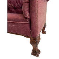 20th century mahogany Chesterfield sofa, upholstered in buttoned crimson fabric, on acanthus carved cabriole supports with ball and claw carved feet