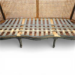 Early 20th century French bergère settee, the shaped caned back flanked by caned sides and scrolling arms, moulded beech frame with dark painted finish, serpentine seat rail with webbing, on cabriole legs with pad feet