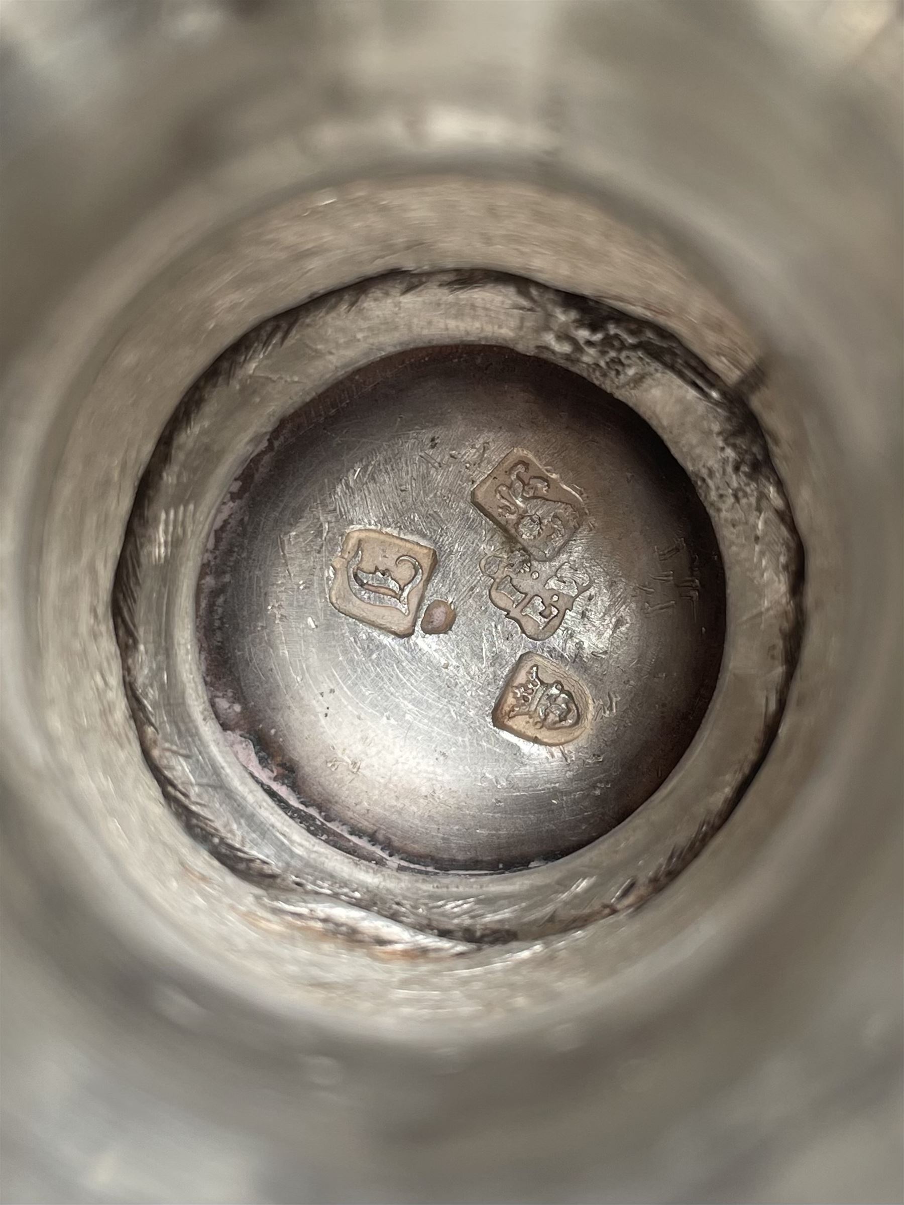 George III silver two handled campana shape cup and cover with pineapple lift, the body with cartouche surrounded by flowers above leaves and scrolls on a pedestal foot with acanthus leaf decoration H29cm London 1764, makers marks rubbed