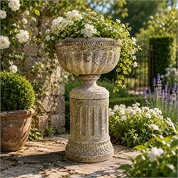 20th century good quality weathered cast stone pedestal urn of ecclesiastical design, circ...