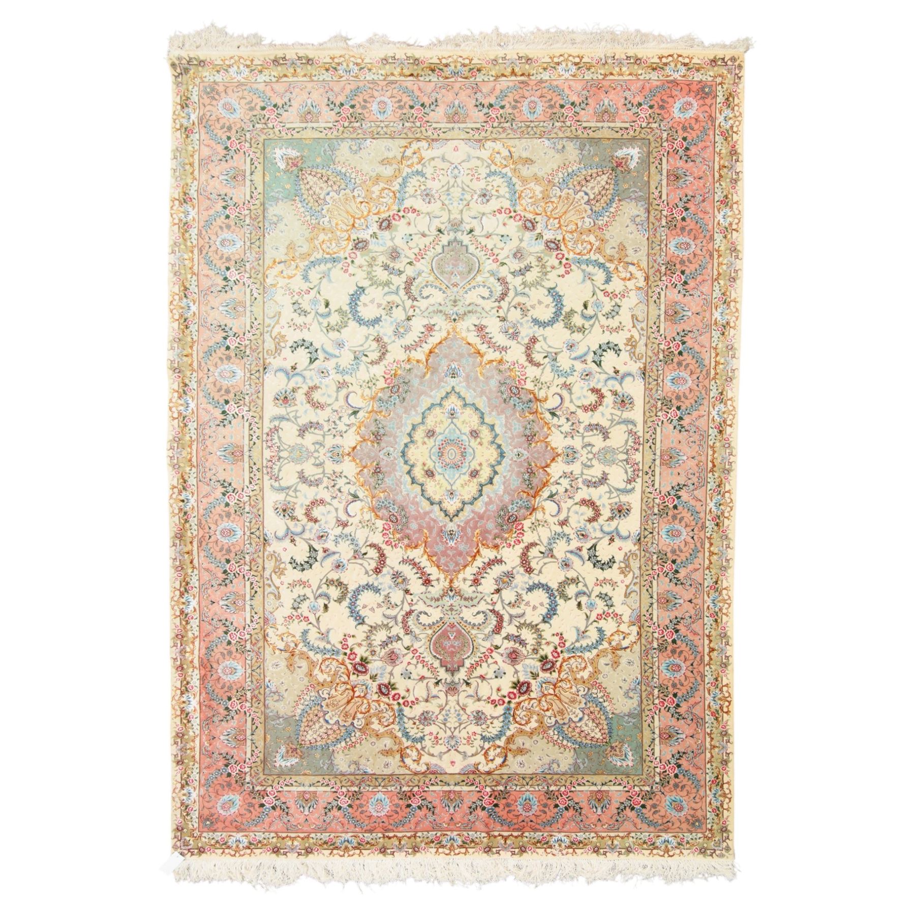 Fine Persian silk inlaid ivory and rose ground Tabriz rug, the busy field decorated with a central foliate pole medallion surrounded by scrolling foliage with trailing flowerheads and bouquets, the multiple guard lines filled with repeating scrolling palmettes and interlocking floral motifs