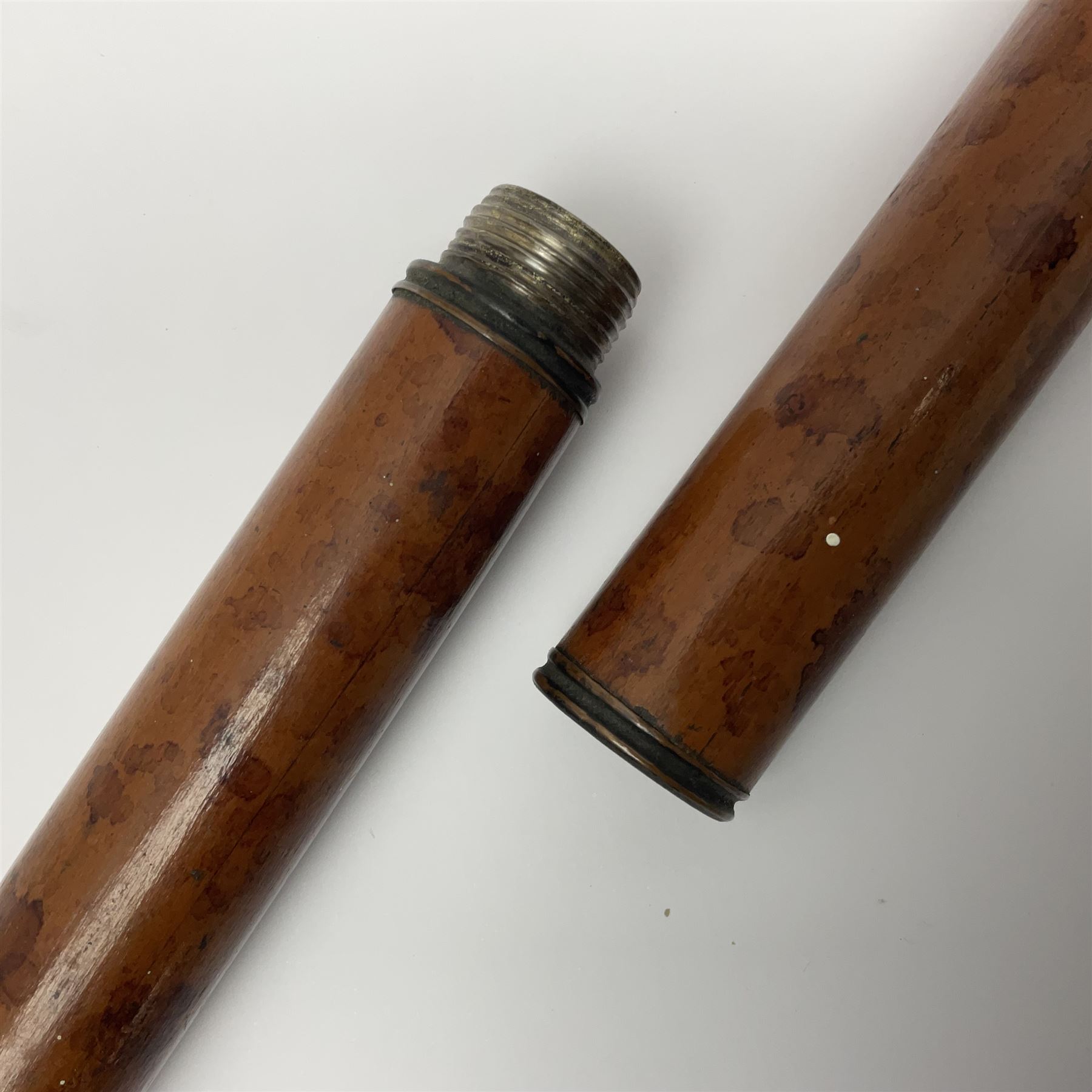 19th century malacca walking cane, the screw threaded domed cover opening to reveal vacant recess, above a further screw threaded opening revealing a removable glass vial with stopper, glass vial L41cm, cane L89.5cm