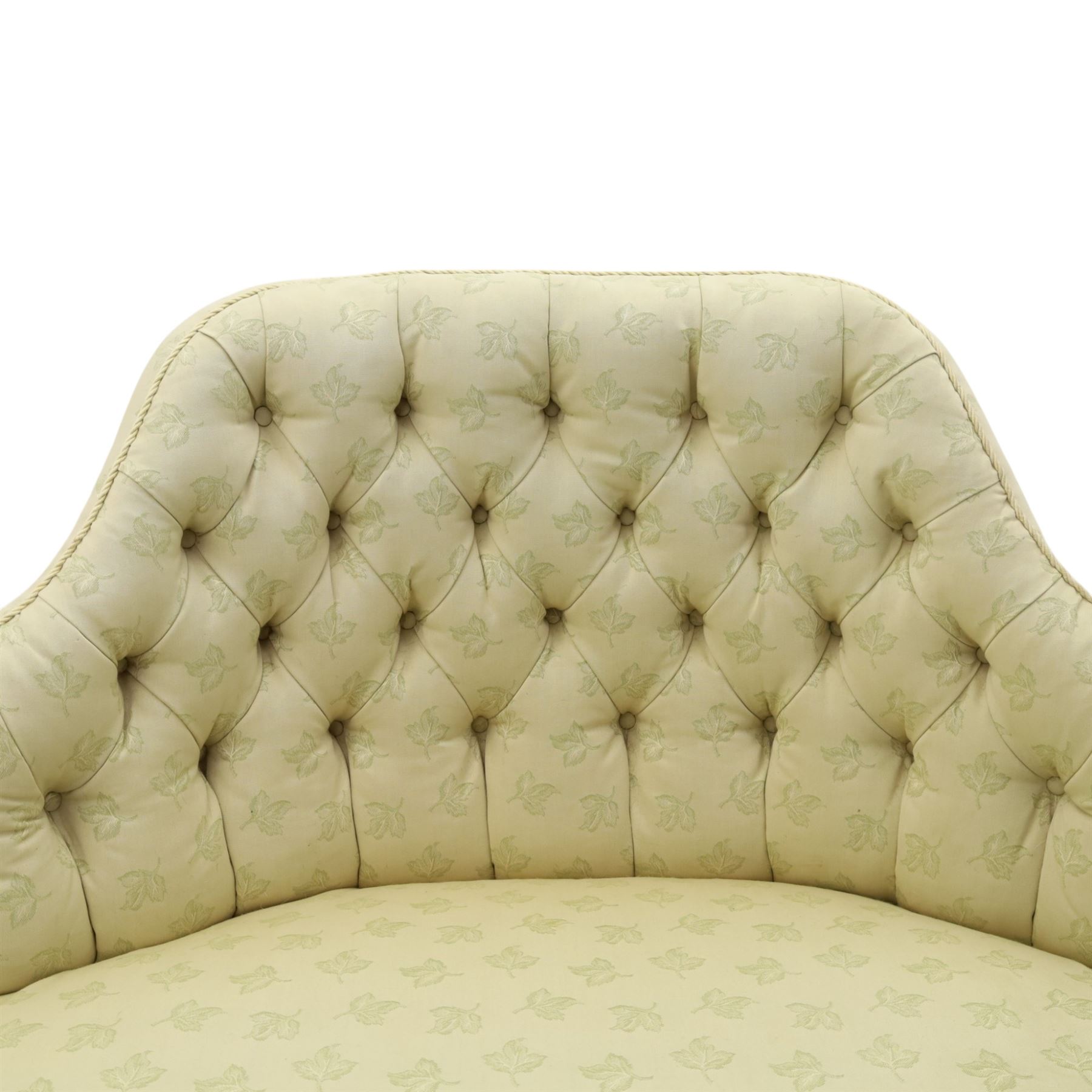 Victorian mahogany frame parlour settee, in back-buttoned ivory fabric