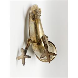 Late 19th century Danish silver drinking horn and cover, the body with hexagonal and beaded finial, raised upon two talon feet and further scroll foot, chased with scrolling foliate and zoomorphic bands, the detachable domed cover with conforming decoration surmounted by a figure holding a hammer, the cover interior impressed with maker's mark (partly worn and indistinct), alongside Danish Three Towers mark for 1881, with the Assay Master mark for Simon Groth (1863-1904), H23.5cm, weight 14.75 ozt (459 grams)

