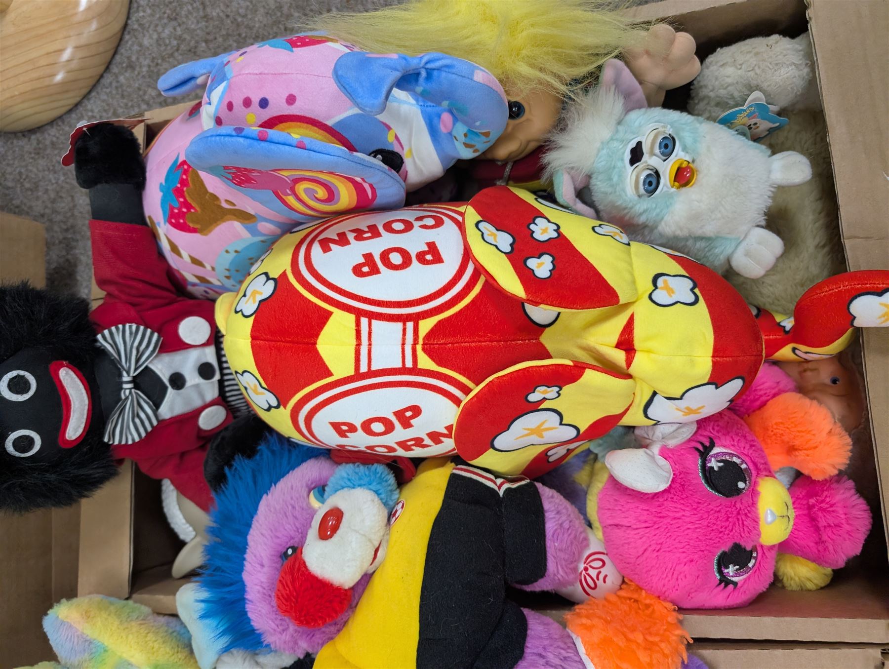 Vintage toys, including Russ Troll Doll and Furby, together with a collection of Care Bears, two Pop Art elephants and similar soft toys
