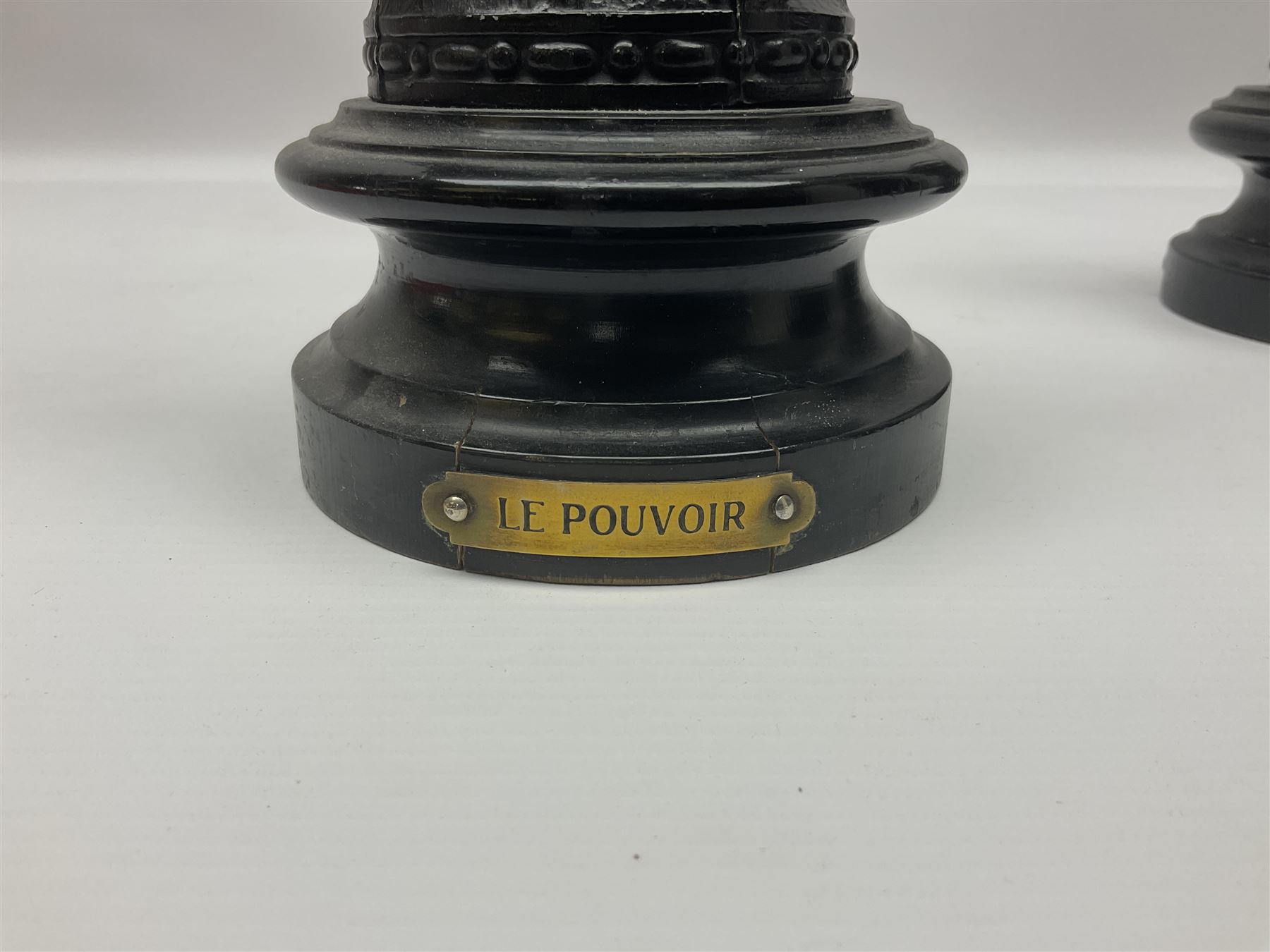 Pair of spelter figures, Le Force and Le Pouvoir, modeled as figures standing on lions, arms held aloft, H51cm 