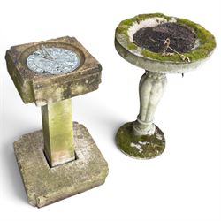 Weathered cast stone birdbath, circular bowl over a lobed baluster pedestal on circular ba...
