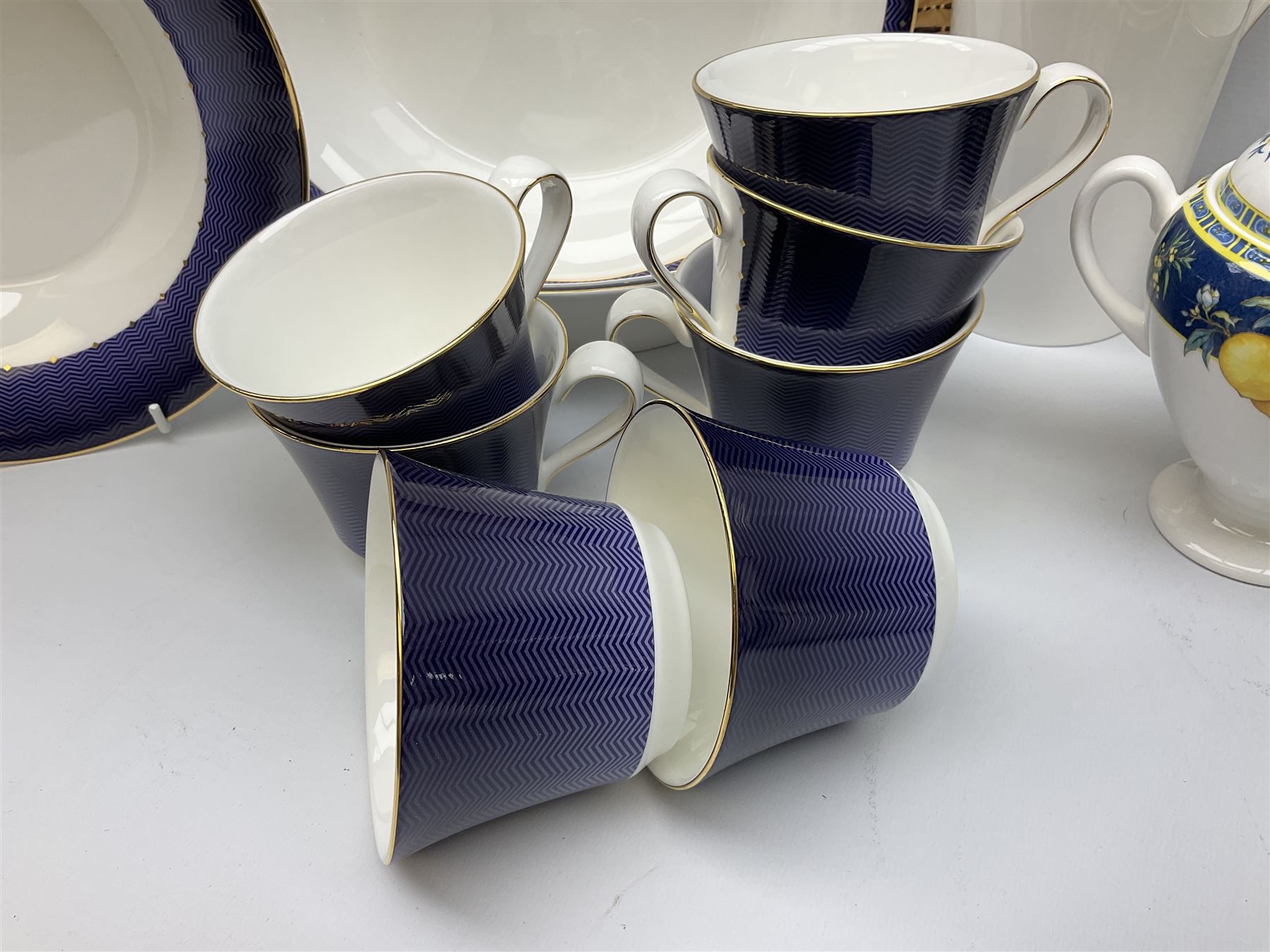 Wedgwood Midnight pattern tea and dinner wares, comprising seven cups and saucers, large jug, eight soup bowls, two large bowls, together with wedgwood citrons coffee wares