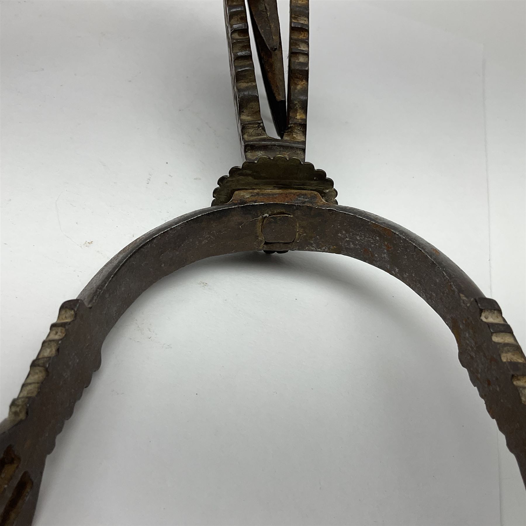 Pair of South American gaucho steel and brass spurs with twenty-two spike heel rowels, possibly Chilean L23cm