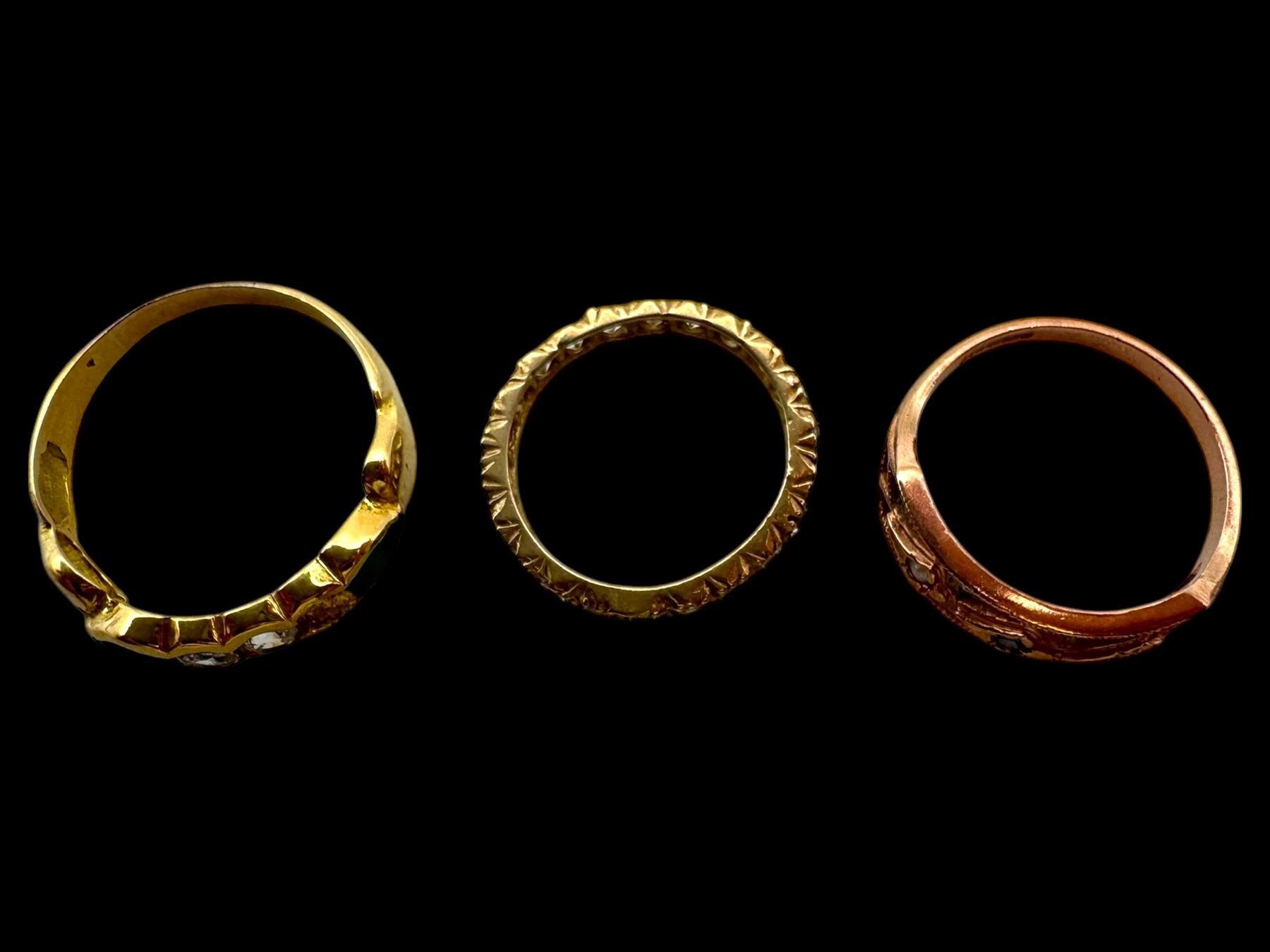 18ct gold stone set ring, 9ct rose gold ring and a 9ct paste set eternity ring