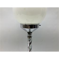 Two art deco table lamps with plastic turned columns raised on a circular feet, together with a chrome twisted table lamp with a opaline milk glass globe shade, tallest example H52cm