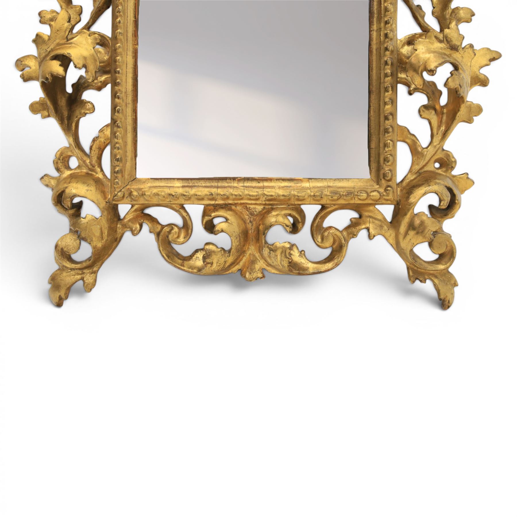 Finely carved Florentine giltwood mirror, acanthus design and egg and dart detailing, bevelled mirror plate 