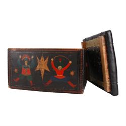 20th century folk art chest, of rectangular form, the front and back painted with dancing figures and stars in polychrome, the sides with conforming stars, upon a black painted ground, with removable leather upholstered top, H30cm W46cm D35cm