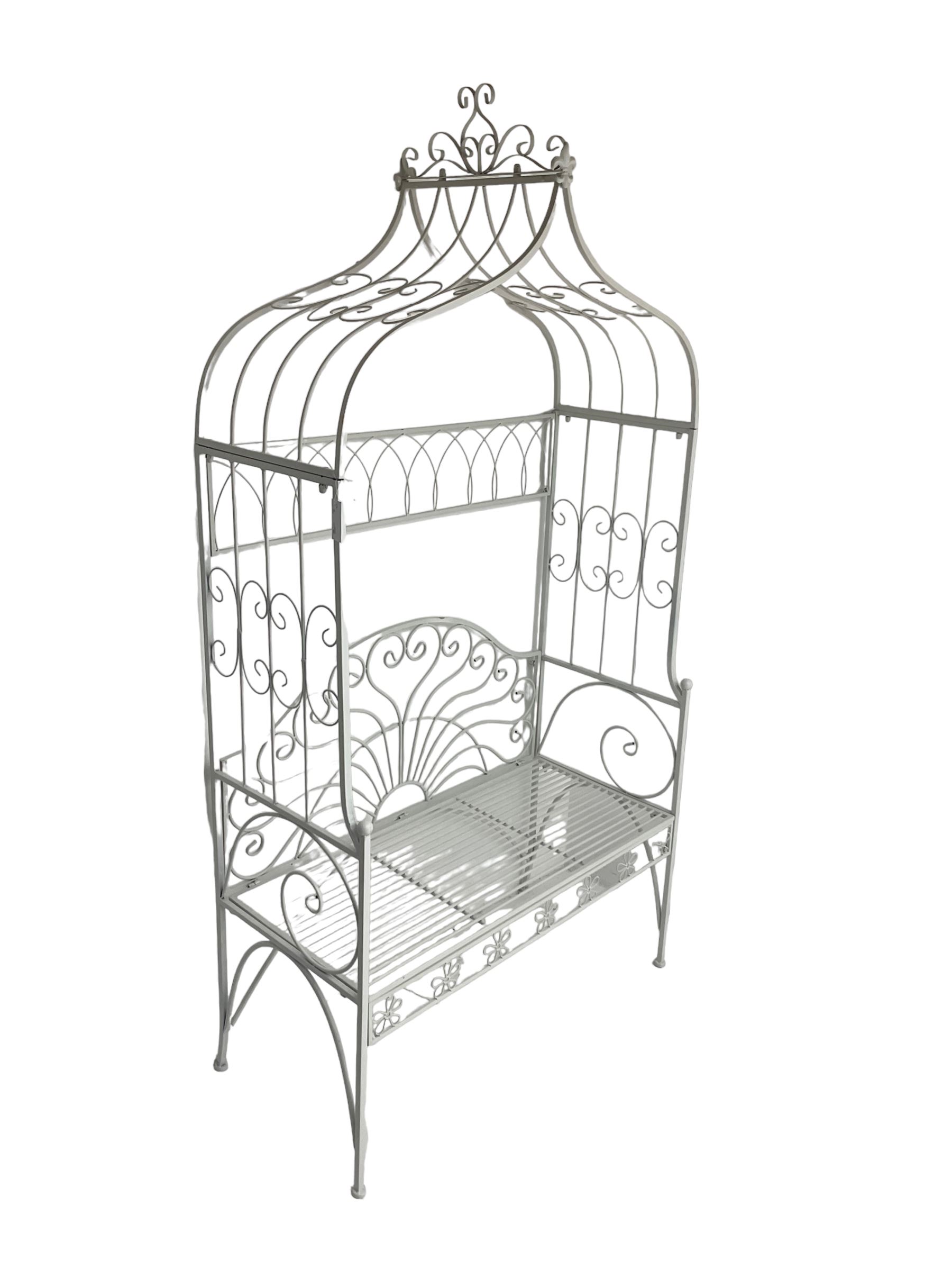 White finish wrought metal garden arbour bench, arched trellis top with scrolling design, lunette style back 