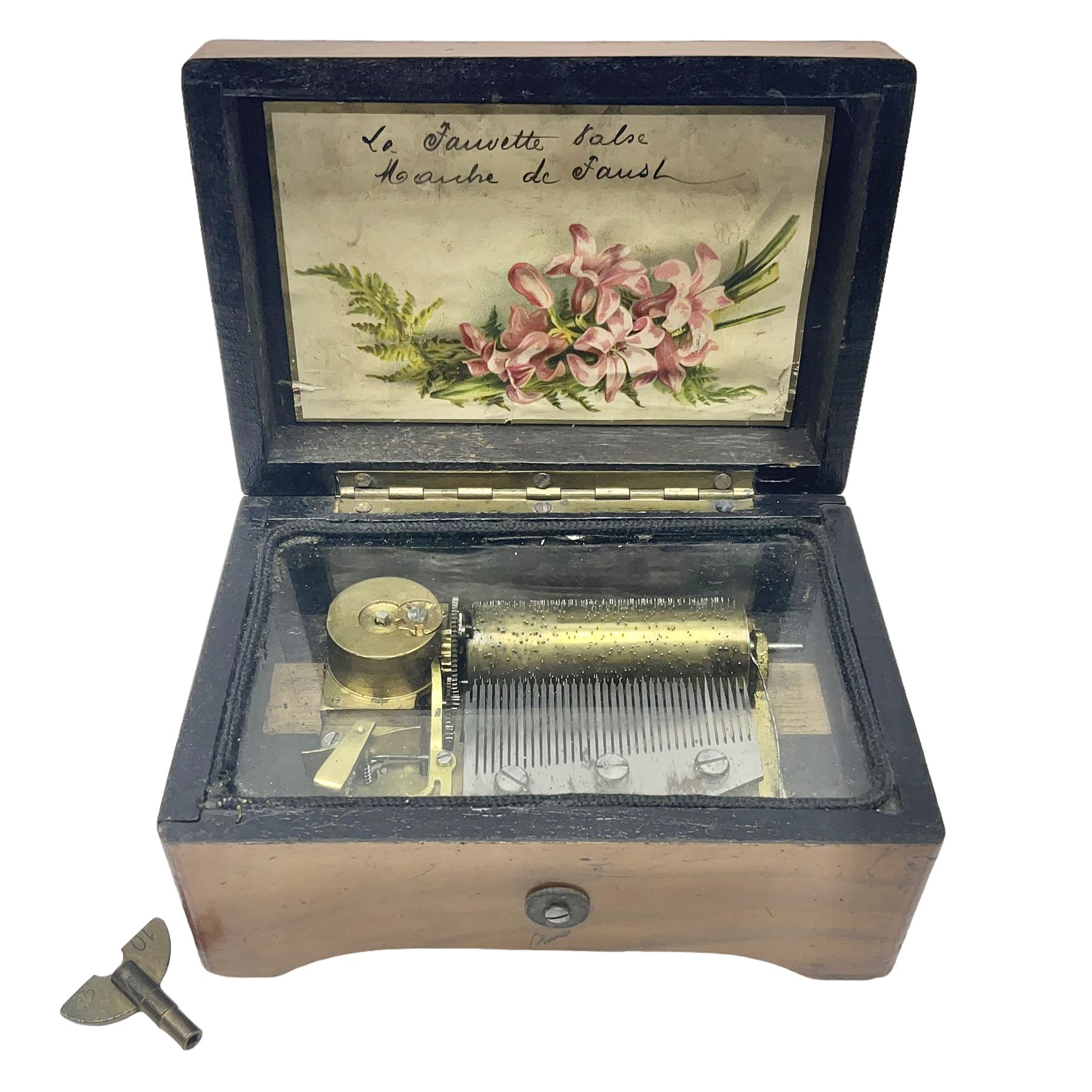 Small late 19th/early 20th century Swiss walnut cased musical box, the overglazed movement with 5cm cylinder and thirty-five tooth comb; the lid with card inscribed 'La Fauvette Salse' and 'Marche de Faust'; under base winding with key; serial no.50443, L12cm