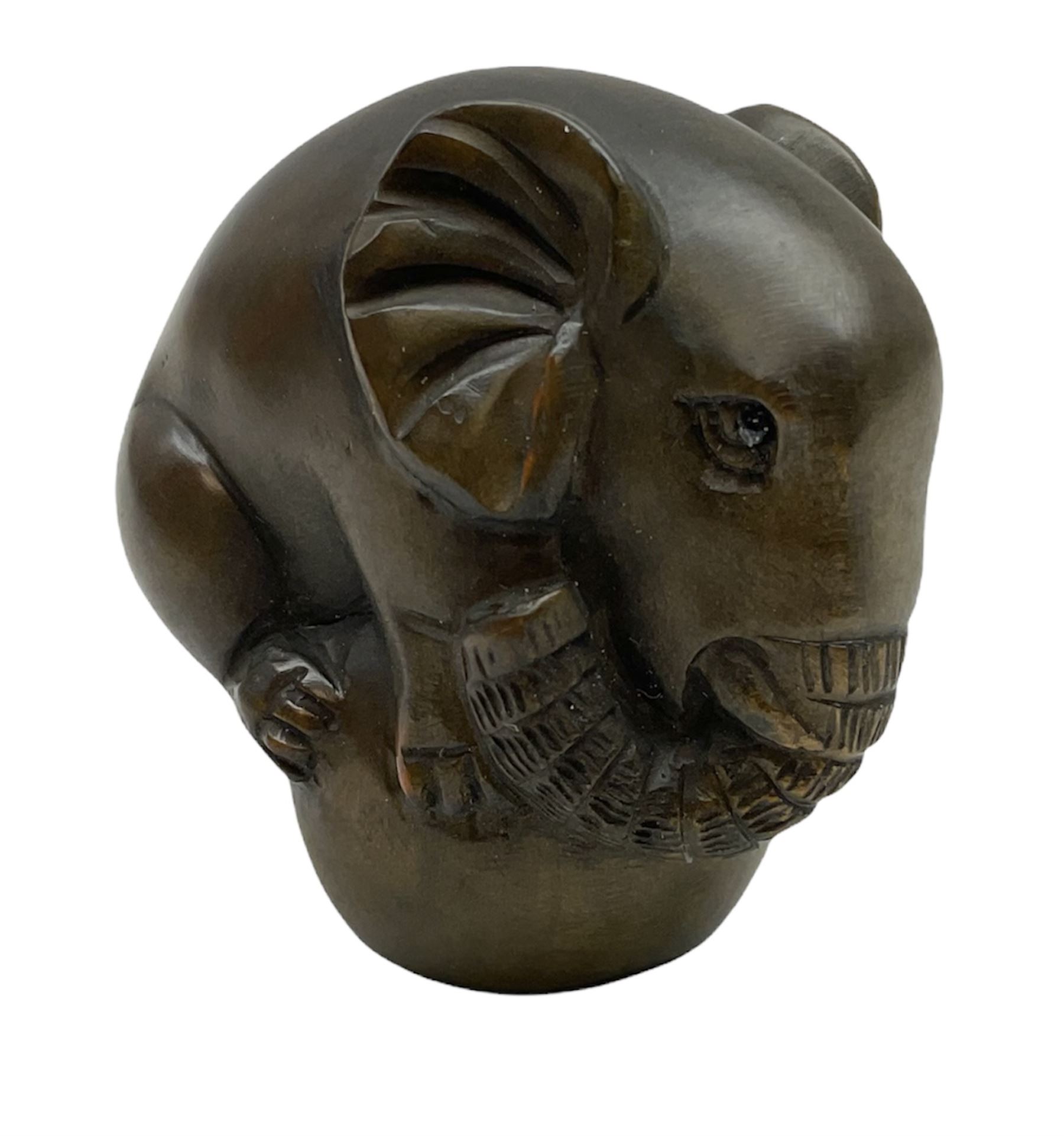 Netsuke in the form of an elephant, signed to base