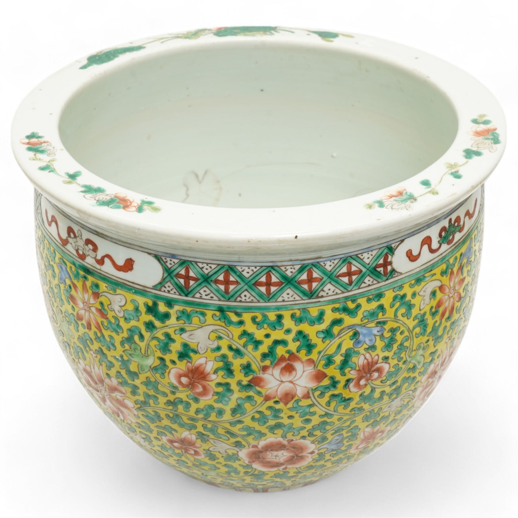 19th century Chinese famille jaune jardiniere decorated with trailing flowers and leaves on a yellow ground H34cm x 40cm