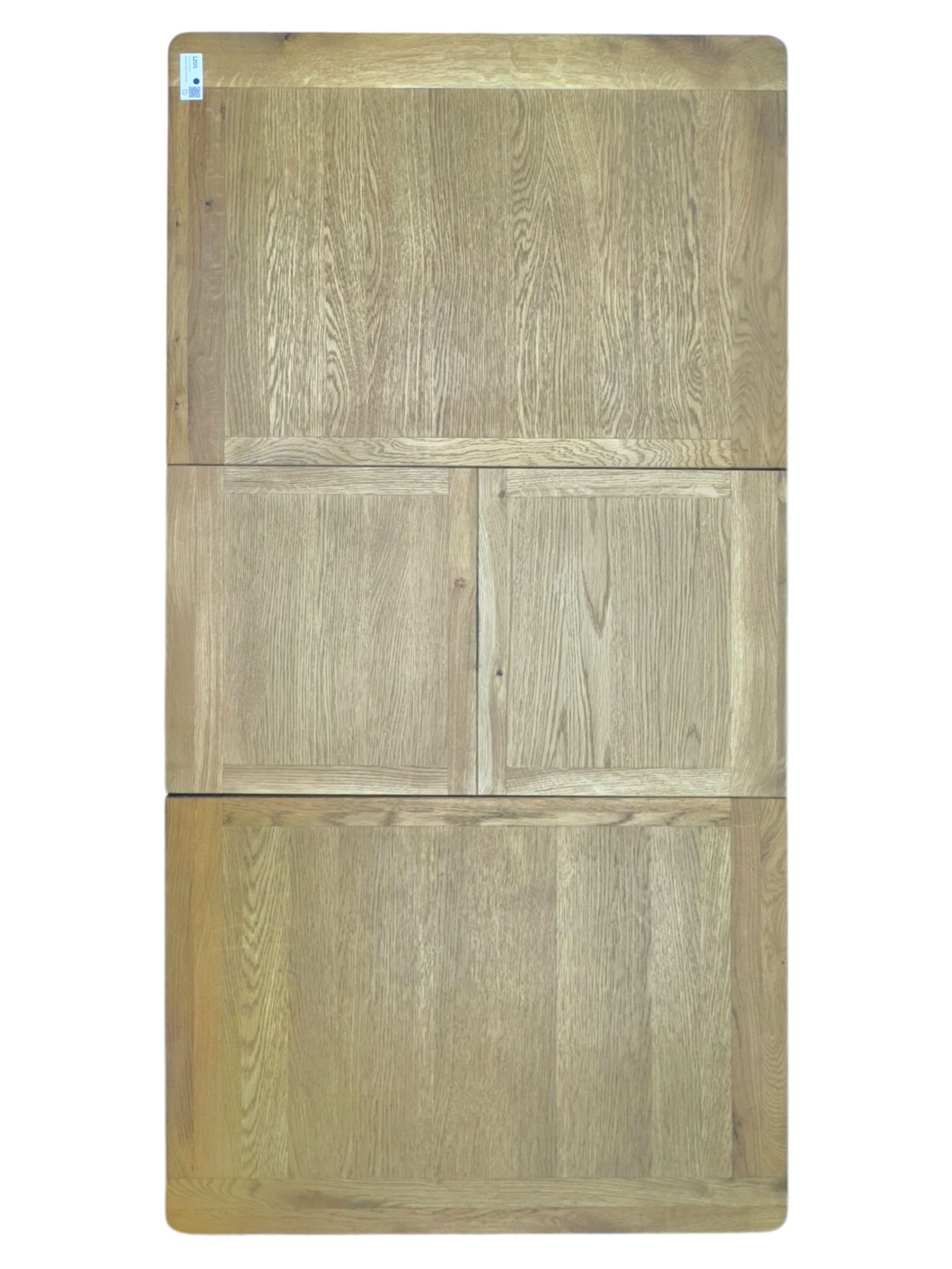 Light oak extending dining table, with four chairs, breadboard ends with integrated fold out leaf with latches, on square supports, tall slatted backrest with brown leather drop in seat  

(Extended 165cm)