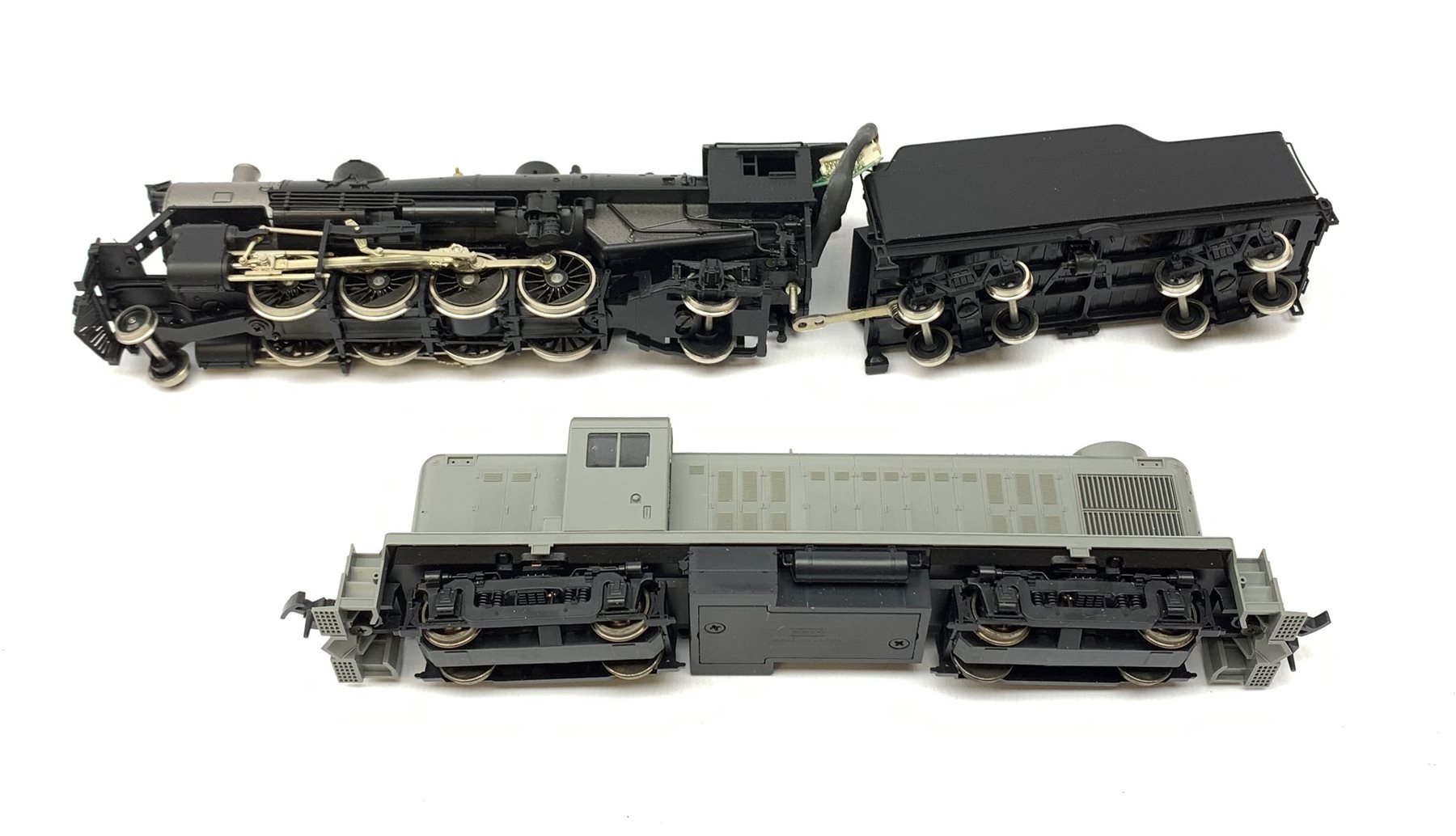 HO scale - Athearn Genesis G9010 USRA 2-8-2 locomotive; and Kato Alco RS2 37-2100 locomotive with unopened sprue parts for completion, both undecorated mint and boxed with paperwork (2)