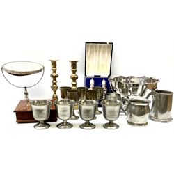 Group of metalware, to include silver plated bowl with lion mask ring handles, cased set of silver plated cruets, pair of brass knopped candlesticks, set of four Continental pewter goblets, marked beneath Sn 95% GT, etc. 