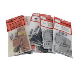 Twenty Parkside Dundas 00 gauge unbuilt model railway wagon kits, mostly LNER bogie bolster wagons and LNER horse boxes, all carded, together with a small collection of decals