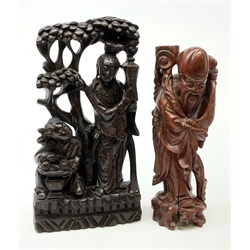 Chinese carved hardwood and silver wire inlaid group depicting two female figures beneath a blossoming tree, H44cm together with another carved hardwood figure of a Sage (2)