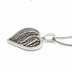 9ct white gold diamond heart pendant necklace, set with rows of round cut fancy light brown and white diamonds, hallmarked, total light brown diamond weight approx 0.75 carat, total white diamond weight approx 0.75 carat