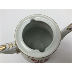 Herend Chinese Bouquet Rose pattern tea service comprising teapot, coffee pot, open sucrier, six cups and saucers, six tea plates, cream jug and stand, milk jug, two teabag holders, preserve pot, two leaf shaped dishes, four egg cups, salt & pepper pots, pair side plates and another plate