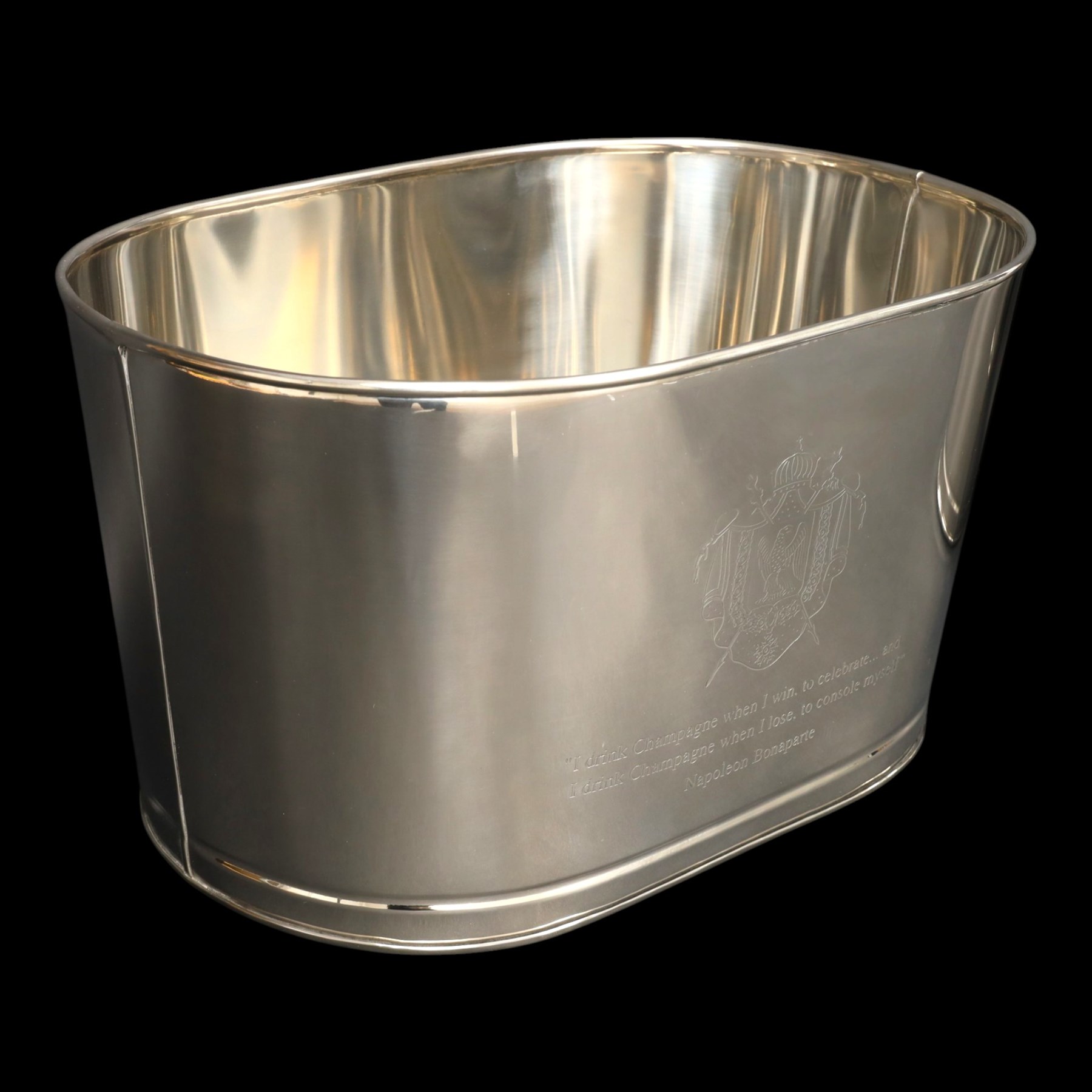 Pair oval champagne coolers, engraved 'I drink champagne when I win to celebrate ... and I drink champagne when I lose to console myself' H25cm, L43cm 