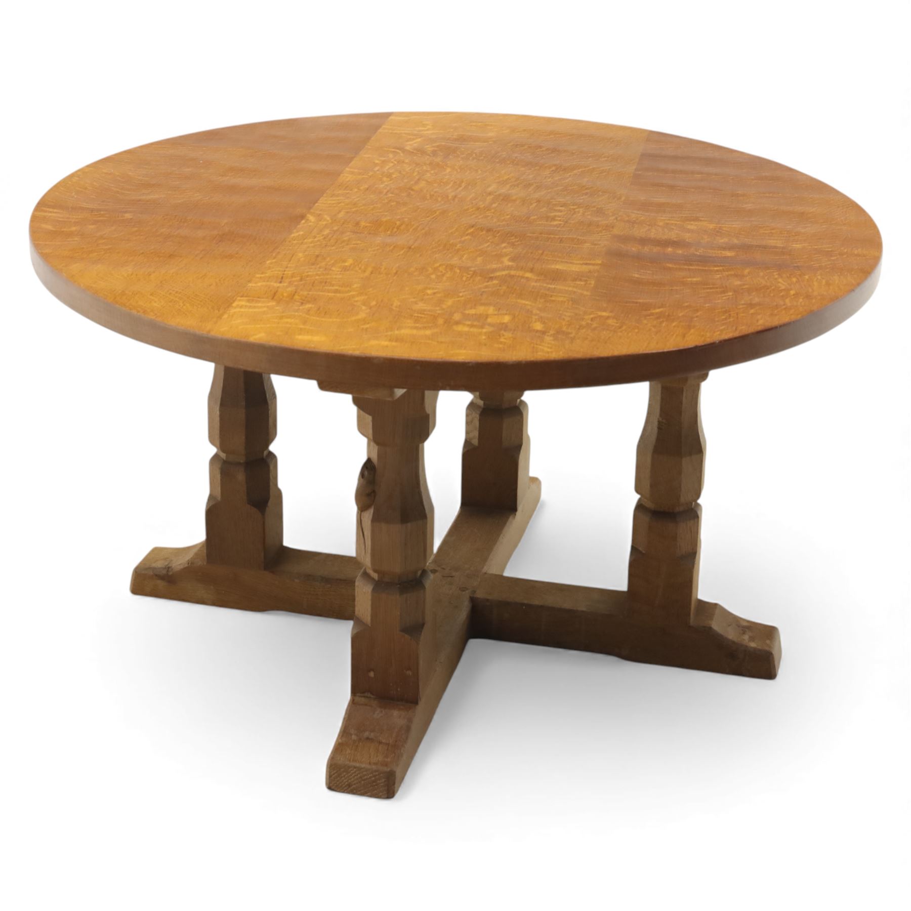Mouseman - oak coffee table, the circular adzd top over four pillars united by stretchers, with signature mouse carving by Robert Thompson of Kilburn 