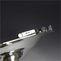 1920s silver swing handled pedestal dish, of octagonal form with shaped rim and foliate border, upon a similar pedestal, hallmarked Cooper Brothers & Sons Ltd, Sheffield 1922, not including handle H7cm